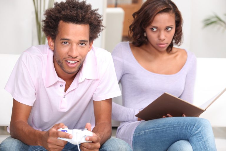 angry black woman ang black buy with video game controller